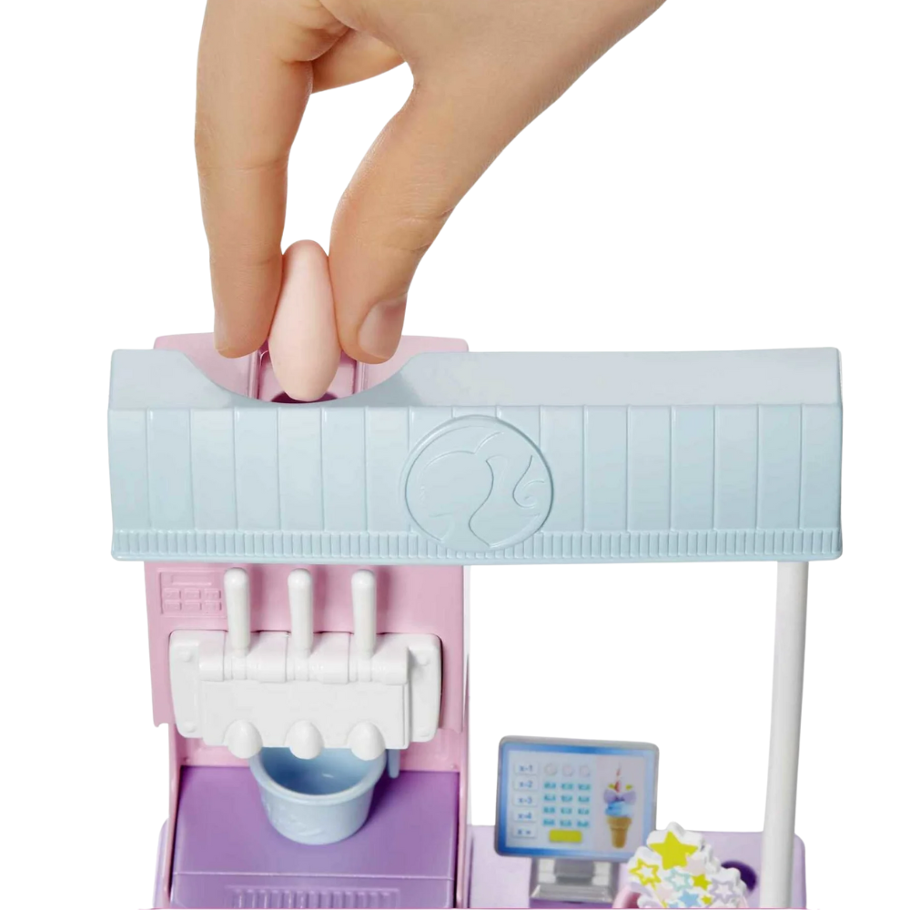 Barbie Careers Ice Cream Shop Playset with Blonde Doll, Ice Cream Machine Children can manage their very own ice cream shop with the Barbie Ice Cream Shop Playset! HCN46 thumbnail