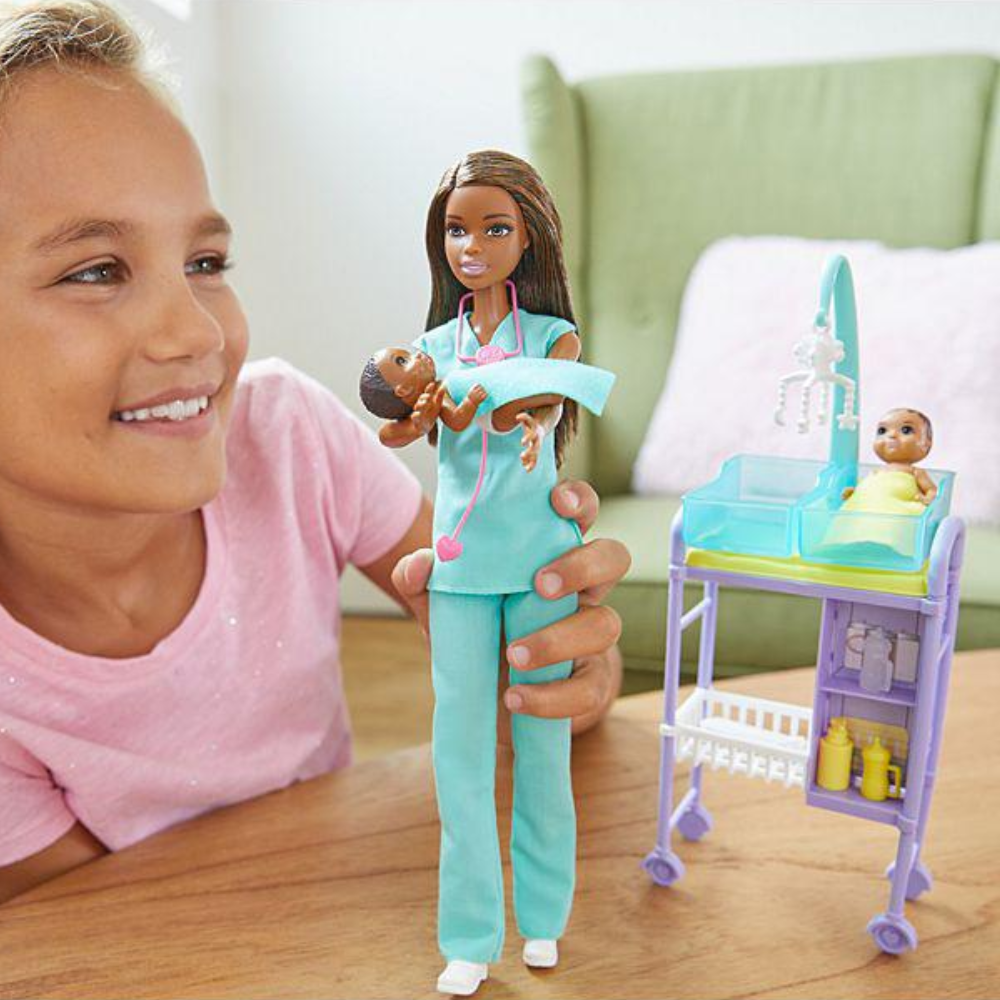 Barbie Baby Doctor Playset with Brunette Doll, 2 Infant Dolls, Exam Table and Accessories Step into the world of healthcare with Barbie medical dolls and playsets GKH24 thumbnail