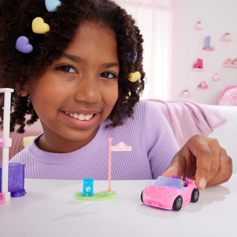 Barbie Mini BarbieLand Toy Vehicle Playset with 1.5-inch Doll & Convertible Car. The Mini BarbieLand vehicle is compact and lightweight, making it easy for little hands to carry and play with anywhere, while boosting creativity and convenience. HYF42 thumbnail