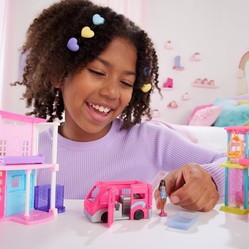 Barbie Mini BarbieLand Playsets with Toy Vehicle & 1.5-inch Doll, DreamCamper. Step into the world of Mini BarbieLand, where big dreams come to life in a miniature Barbie world full of imagination and endless possibilities! HYF39 thumbnail