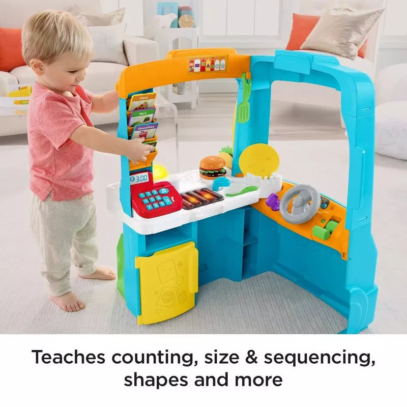Fisher-Price Laugh & Learn Servin' Up Fun Food Truck with 20+ Piece Accessory Set thumbnail