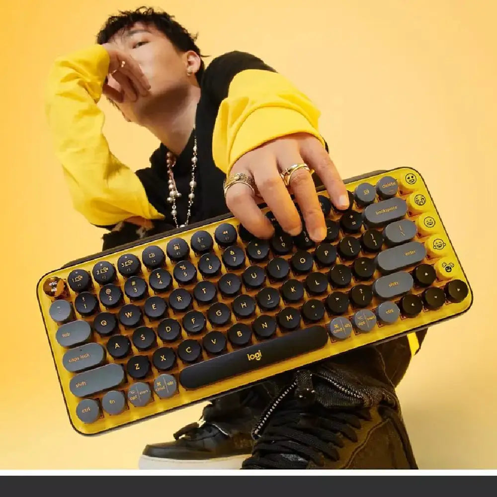 Logitech POP KEYS WIRELESS MECH KEYBOARD BLAST YELLOW WITH EMOJI KEYS. Express your digital personality with 8 interchangeable emoji keys and a dedicated emoji menu key on this retro-inspired mechanical keyboard. 920-010707 thumbnail