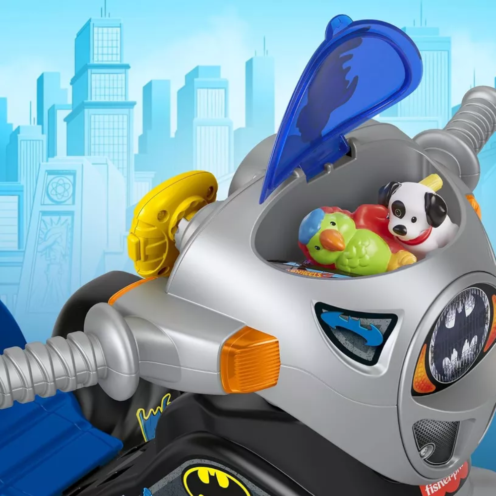 Fisher-Price Toddler Tricycle DC Super Friends Batman Lights & Sounds Trike. This trike lights up and plays action-packed sounds to enhance the fun. It also comes with a toy walkie-talkie that features voice lines from Batman himself. HCF39 thumbnail