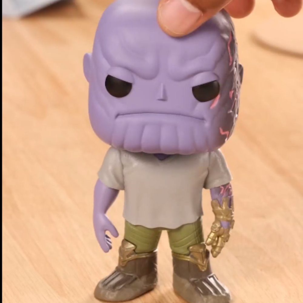 Funko Pop! Marvel: Avengers Endgame - Casual Thanos with Gauntlet. Thanos wears the Infinity Gauntlet on his left hand for a strategic reason—he is naturally right-handed. F-45141 thumbnail